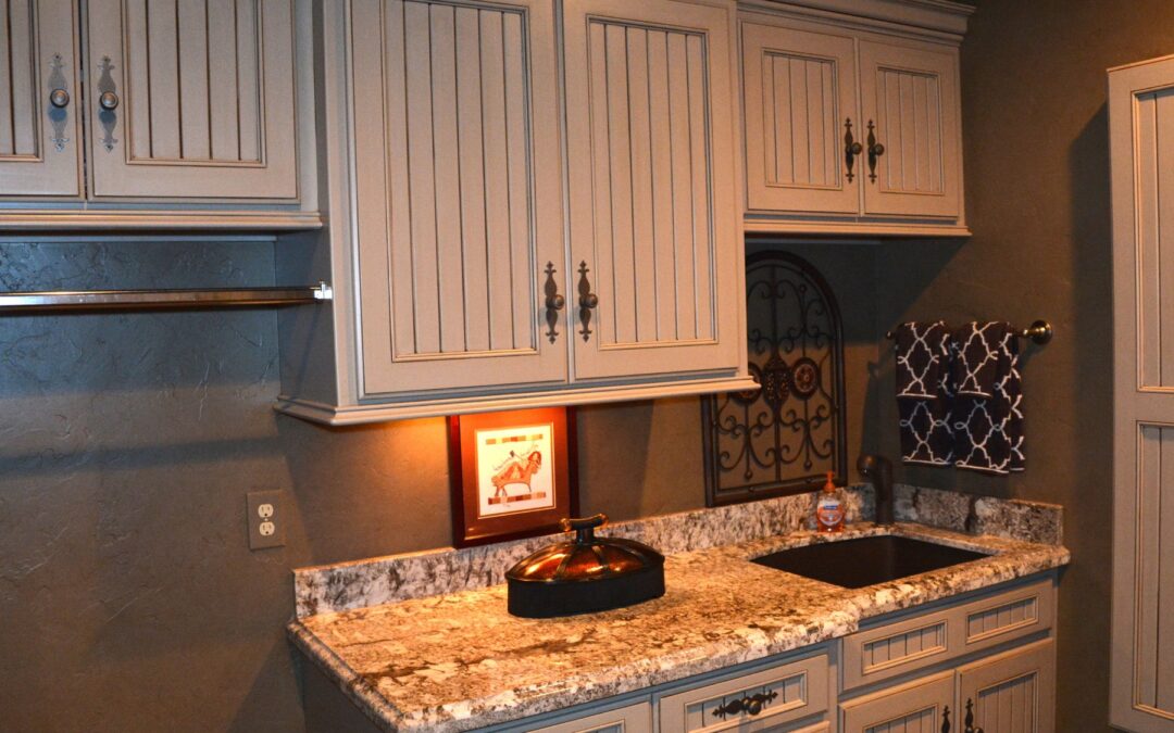 Light-colored kitchen cabinets with fresh paint.