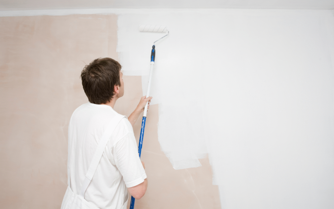 Man painting a wall